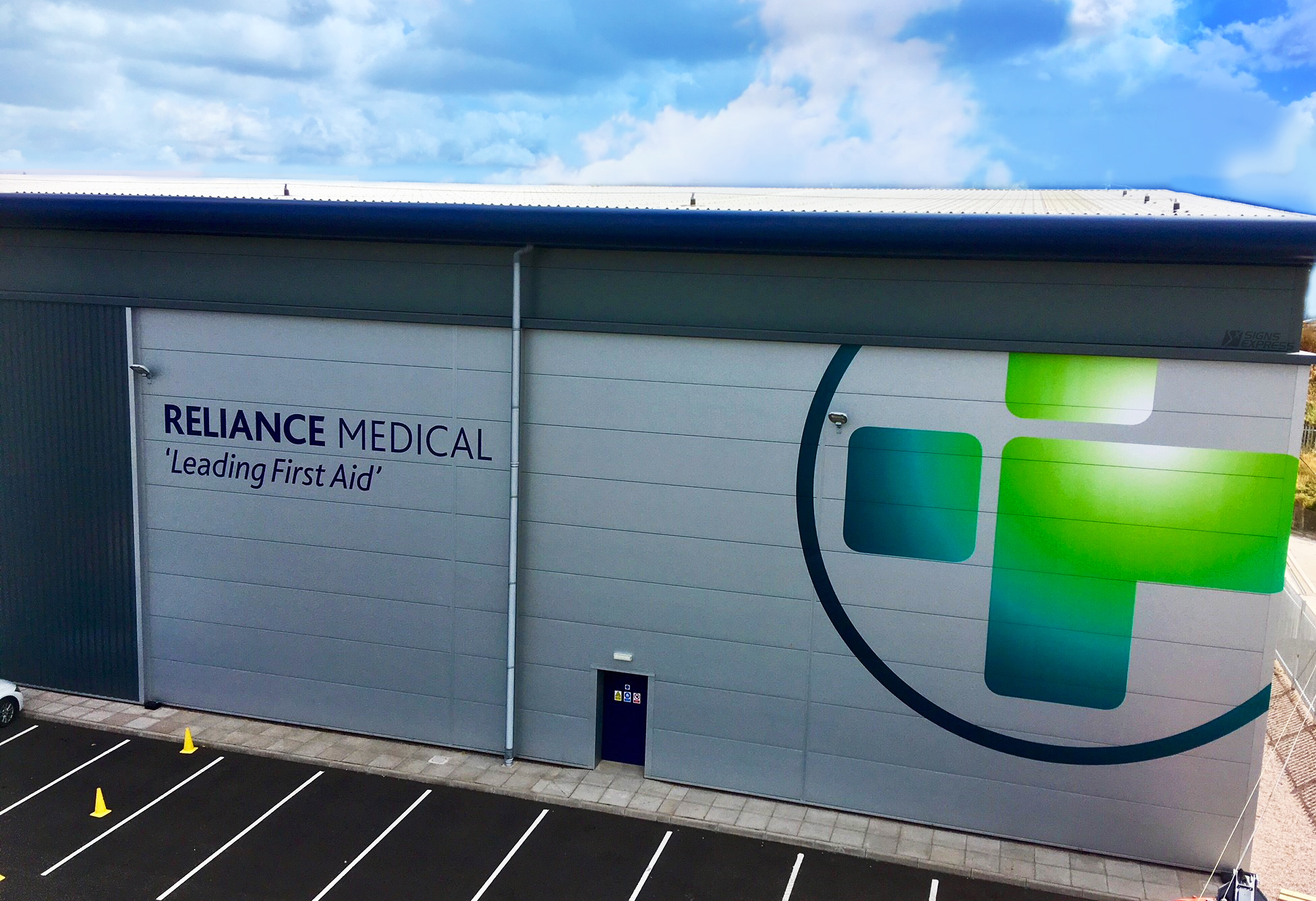 A Business Owner News Signs Express Franchise